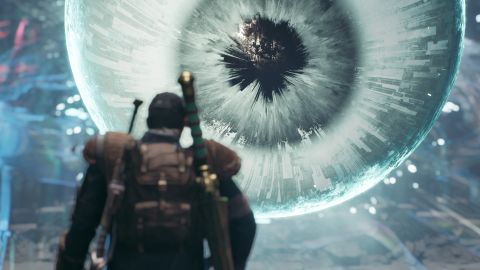 Man stands in front of a big eye.